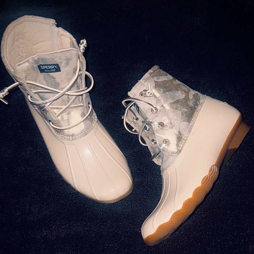 Cream colored Sperry Boots